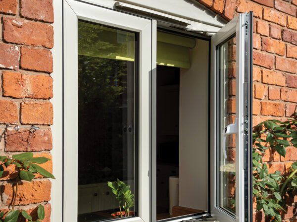 Flush uPVC casement windows installed on a period property, replicating timber aesthetics