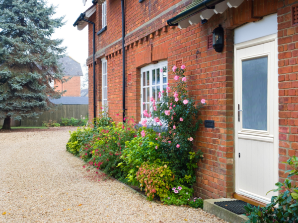 Solid composite front door in a bold colour with multi-point locking system