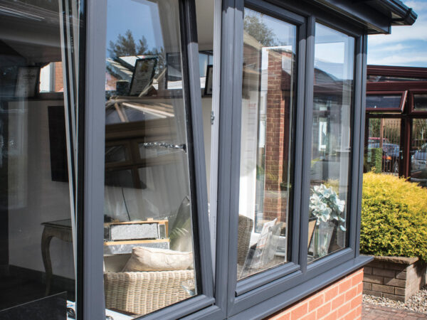 White uPVC tilt and turn window open in tilt position for ventilation