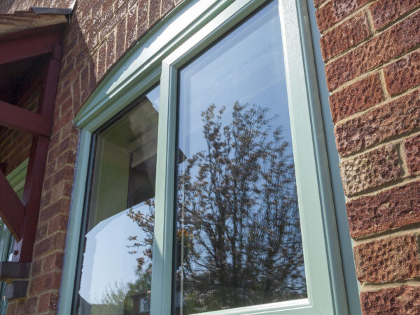 Chartwell green sculptured uPVC casement window by Profile 22 Optima