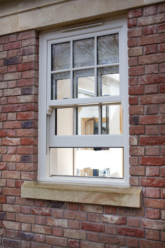uPVC vertical sliding sash window installation showing clean sightlines and heritage styling