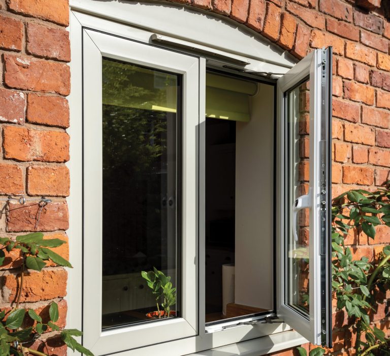 Flush uPVC casement windows installed on a period property, replicating timber aesthetics